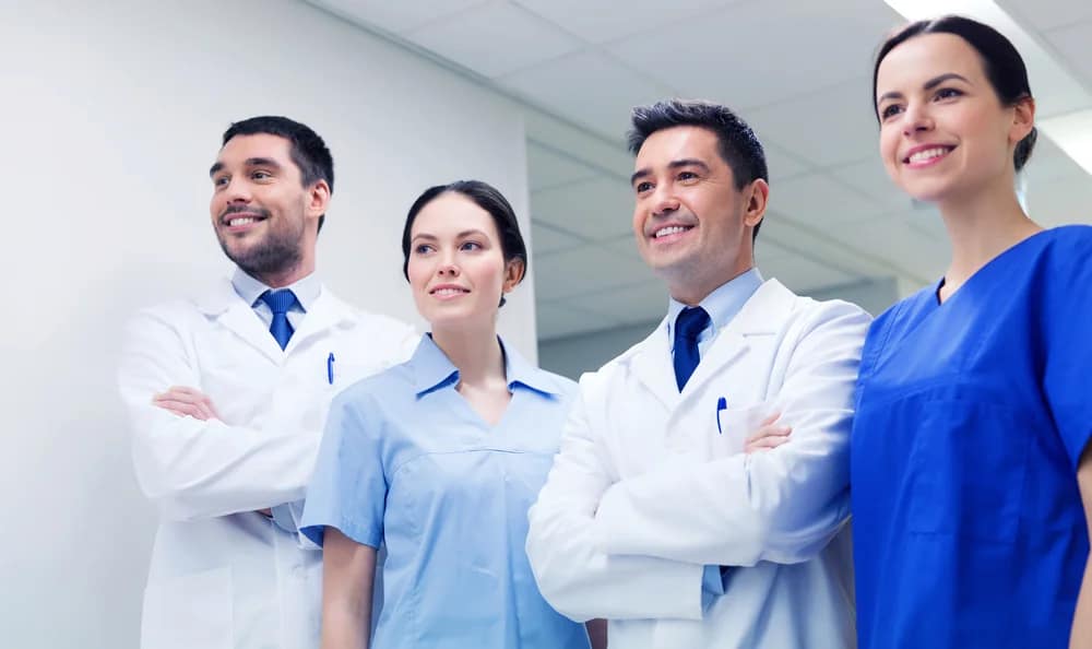 group-of-happy-medics-or-doctors-at-hospital-corridor-by-ground-picture