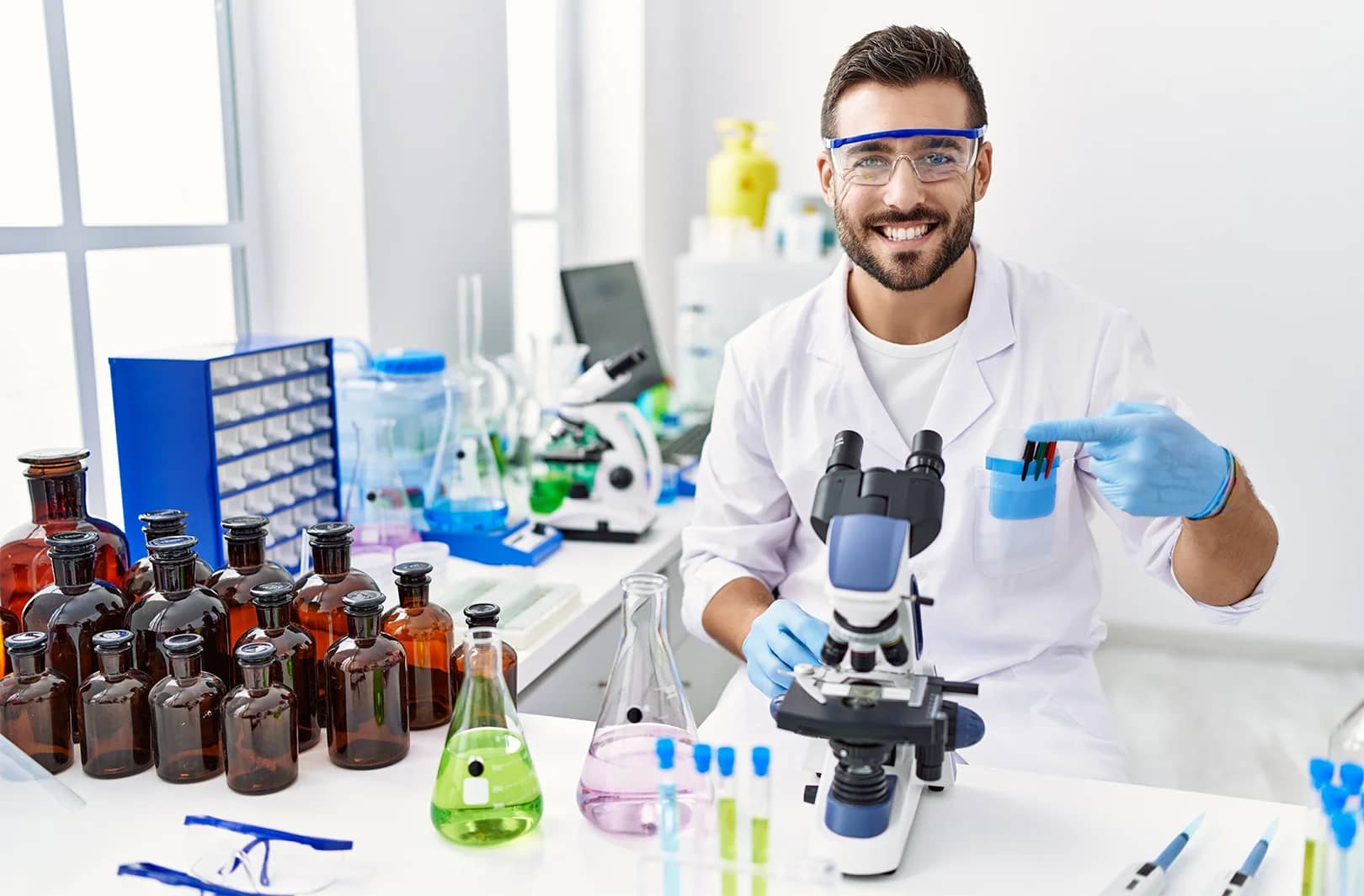 a-handsome-hispanic-man-working-at-a-scientific-laboratory-by-krakenimages-com-from-adobe-stock