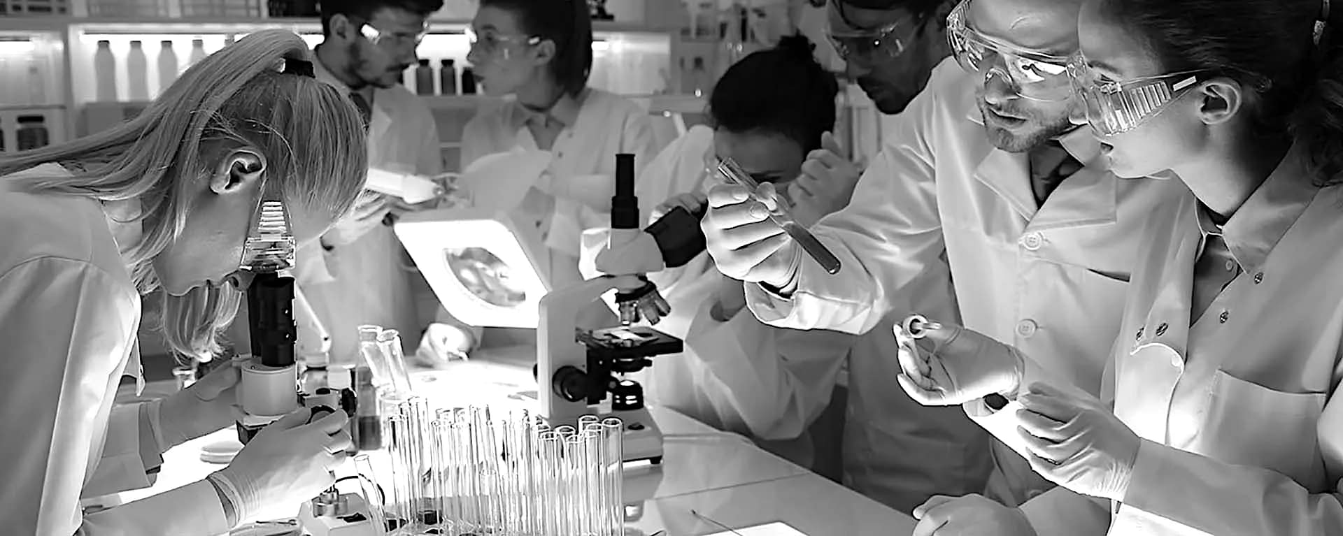 scientist-in-a-lab-working-on-a-expiriment-from-washburn-university-black-&-white